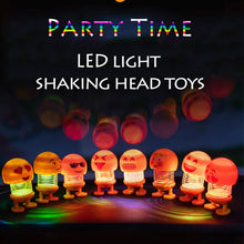 Dancing LED emoji doll for car interior.